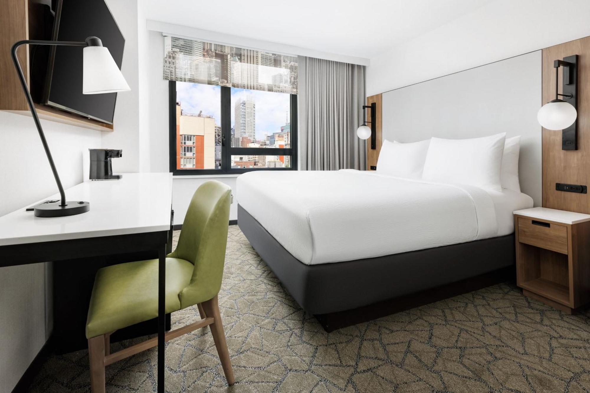Quarto King com Vista Cidade - Acesso a Hóspedes com Audição Condicionada