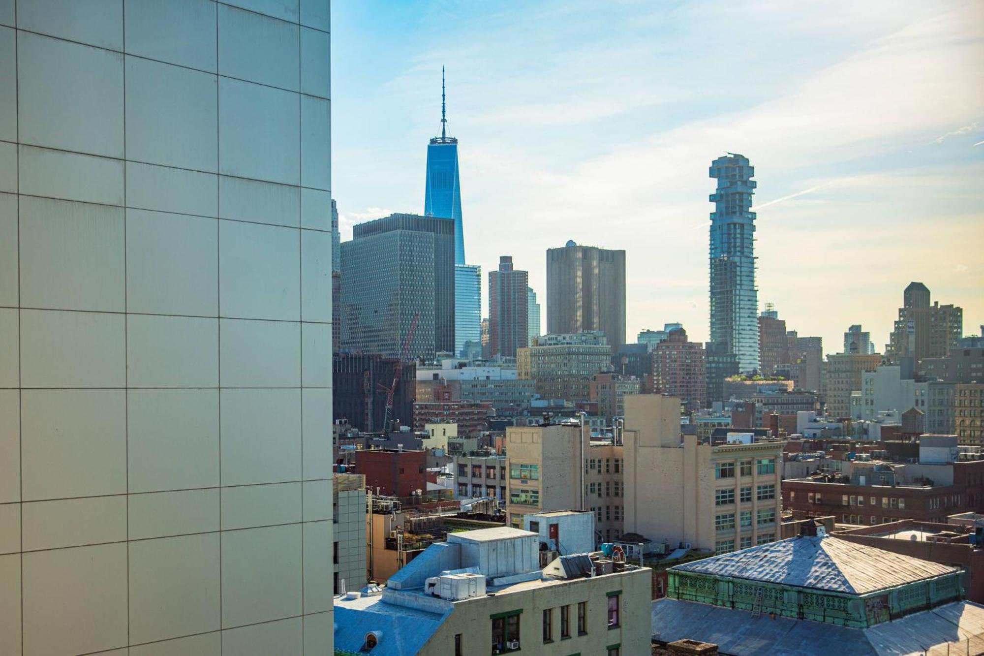 Habitación Doble con vistas parciales a la ciudad y cama extragrande