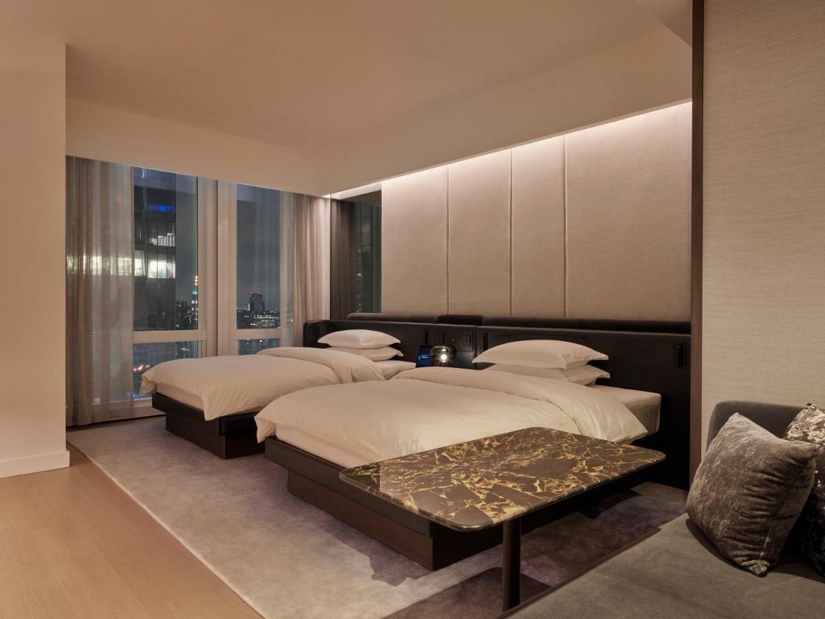 Habitación Deluxe con vistas a la ciudad - 2 camas dobles - Adaptada para personas con movilidad reducida
